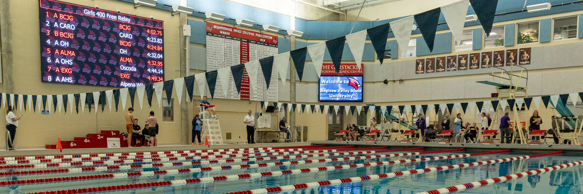 Picture of pool with both digital signs